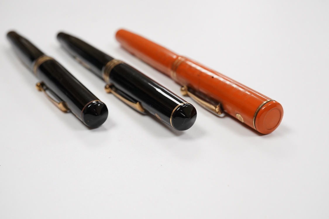 A Wahl Eversharp red hard rubber pen (crack to cap) and two other Wahl pens for spares